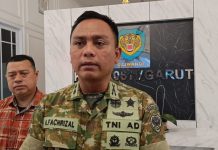 Viral Pria Berkaos Loreng Diduga Halangi Polisi di Garut, Dandim Tegaskan Bukan Anggota TNI Aktif