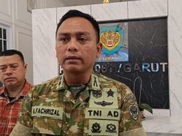Viral Pria Berkaos Loreng Diduga Halangi Polisi di Garut, Dandim Tegaskan Bukan Anggota TNI Aktif