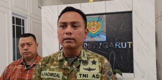 Viral Pria Berkaos Loreng Diduga Halangi Polisi di Garut, Dandim Tegaskan Bukan Anggota TNI Aktif